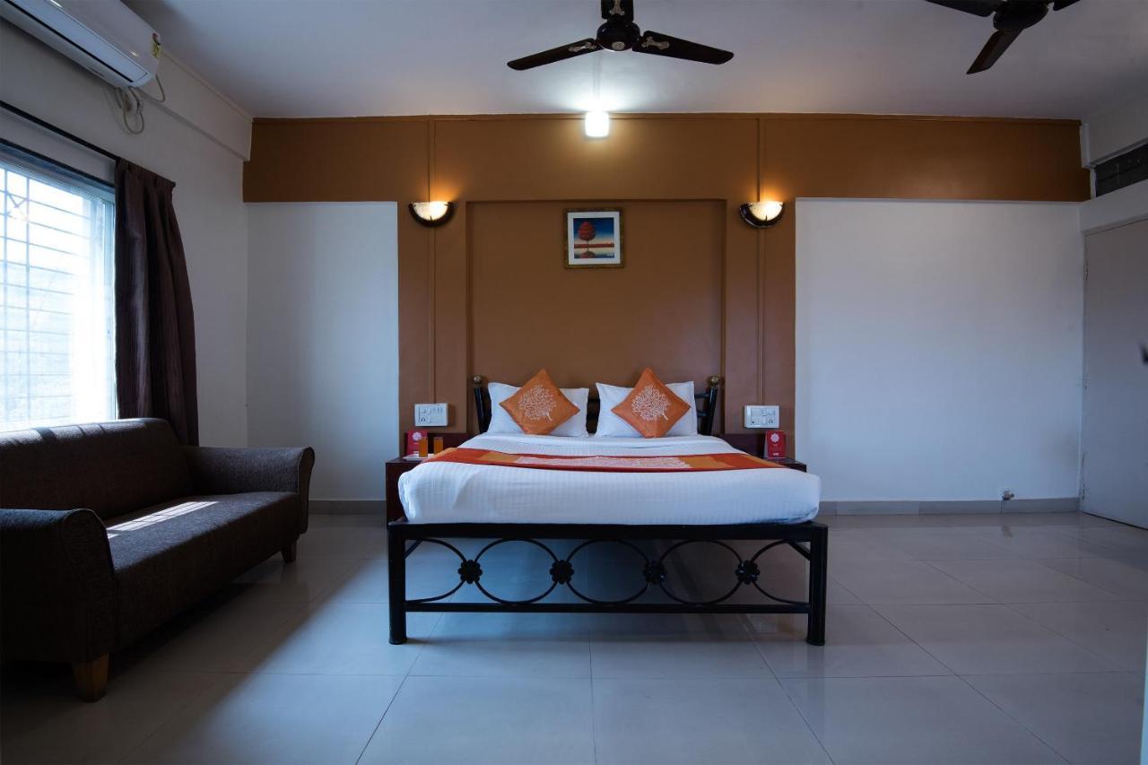 Oyo 1065 Hotel Hmr Royal Inn Pune Bagian luar foto